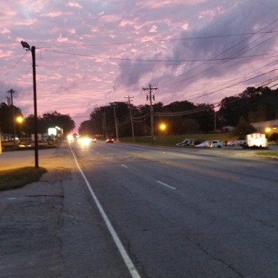 Grinding up old pavement markings and applying new pavement markings in South Carolina