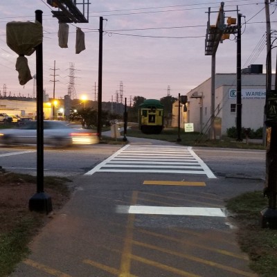 Grinding up old pavement markings and applying new pavement markings in South Carolina