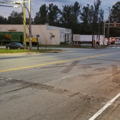Grinding up old pavement markings and applying new pavement markings in South Carolina