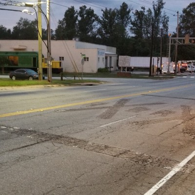 Grinding up old pavement markings and applying new pavement markings in South Carolina