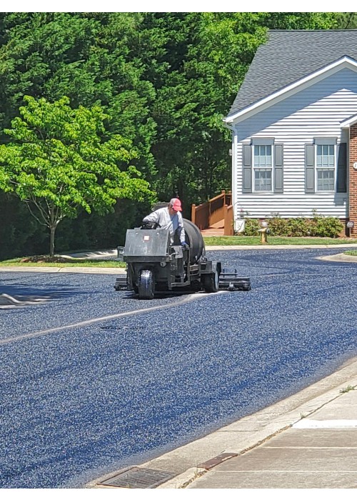 Asphalt Rejuvenation at Homeowners Association in Garner NC.