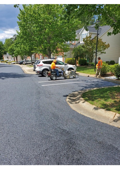 Asphalt Rejuvenation at Homeowners Association in Garner NC.