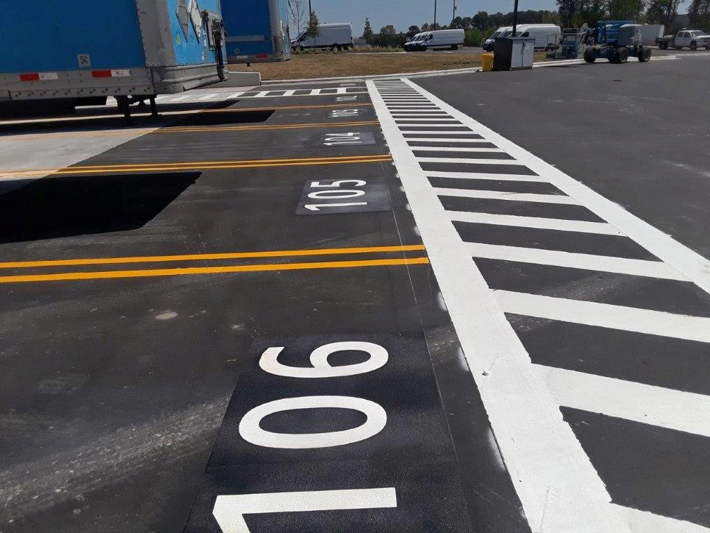 Line Striping, Signage and Bollards for Amazon Kinston, NC IWC
