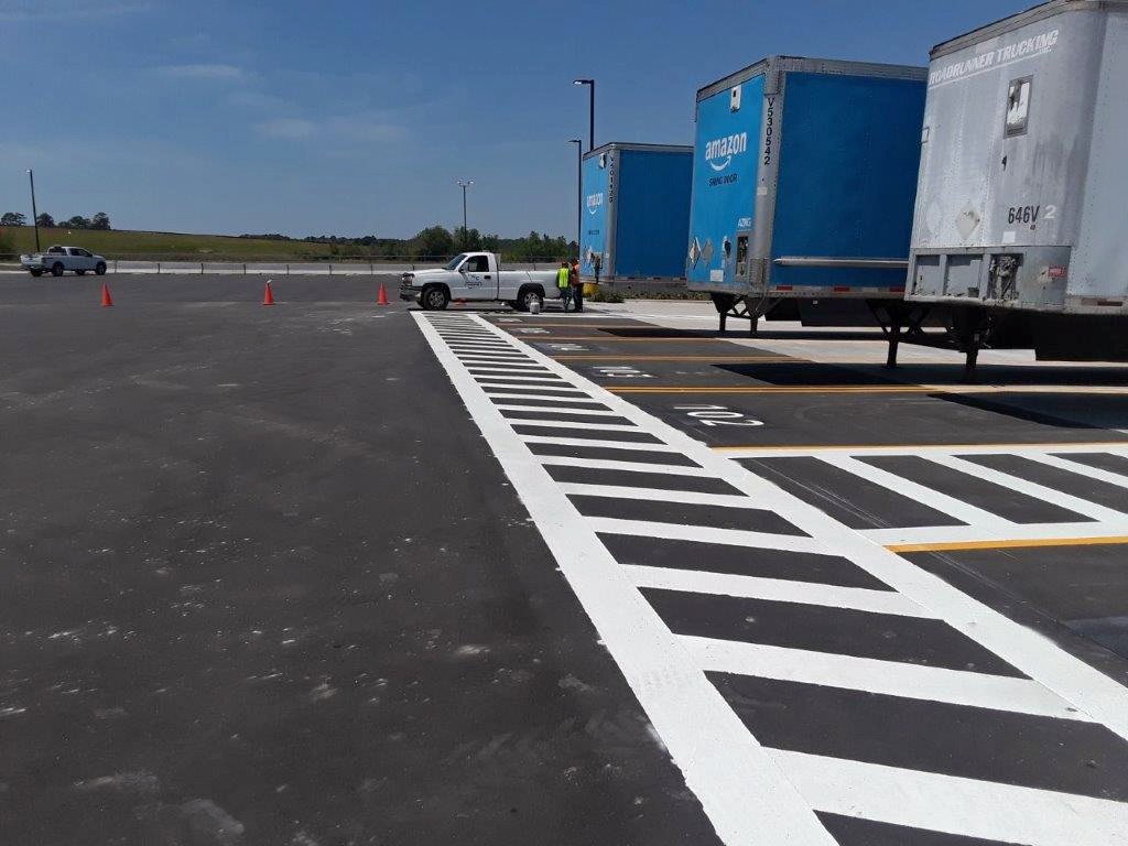Line Striping, Signage and Bollards for Amazon Kinston, NC IWC